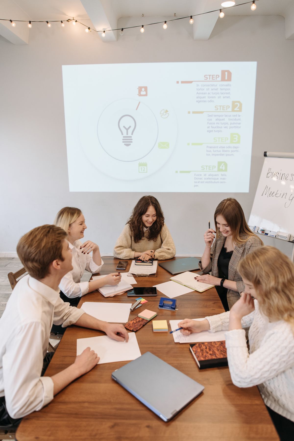 Illustrative photograph of professionals collaborating; not the NACG team